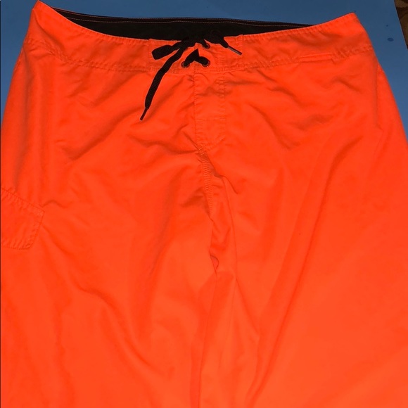 neon orange swim shorts